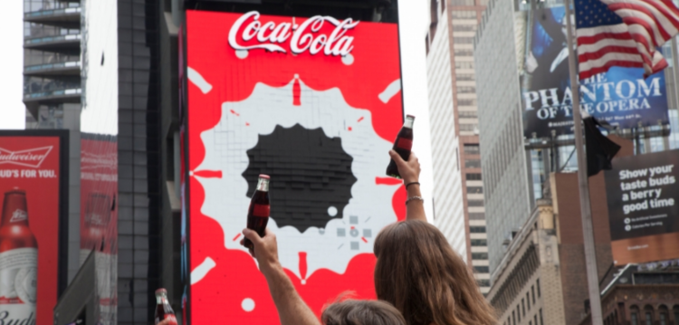 Image:  Coca-Cola and Fans Celebrate World’s First 3D Robotic Sign in Times Square